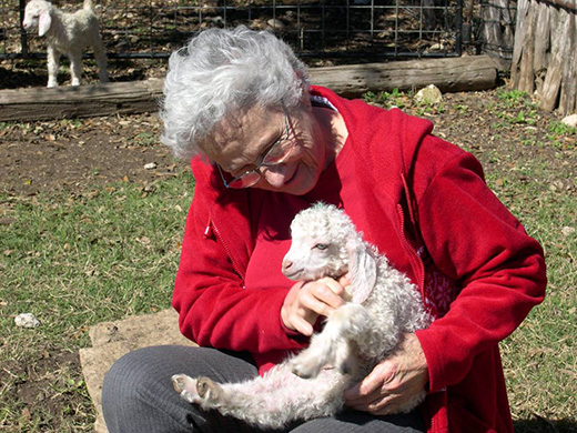 Lora B Davis Garrison with her goats